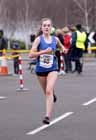 Lydia Turner (Birtley) finishing the first leg in third place, senior womens Elswick Road Relays.